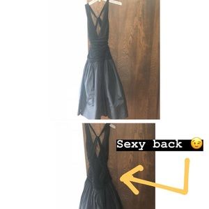 This sexy black dress needs a home!